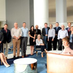 The HFM team gathered in the Australia Place building lobby