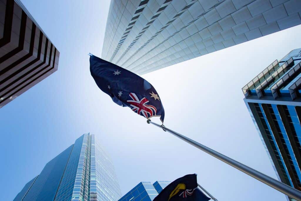 Australian flag amongst energy efficient buildings